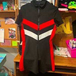 I am selling a shorts romper, black red with a little white. Short sleeves.